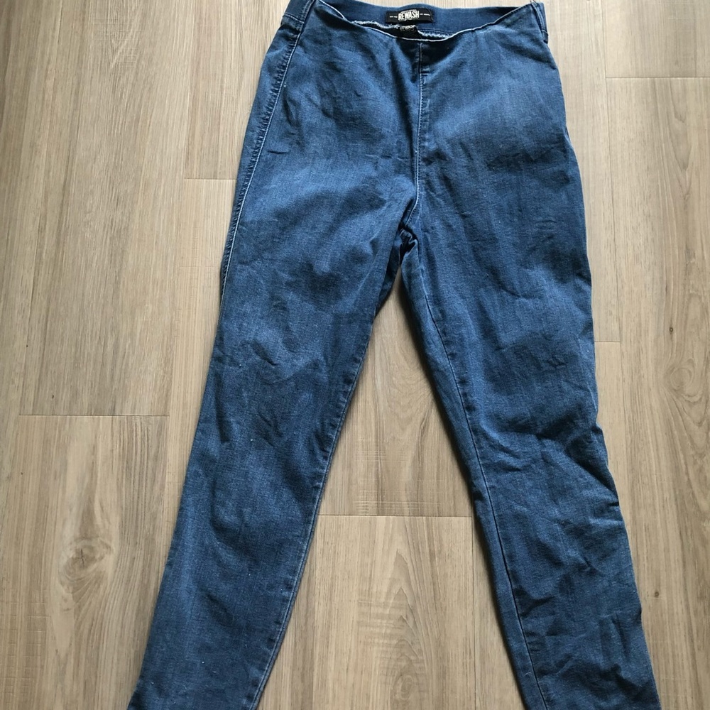 Bottom of pants are frayed, made like that